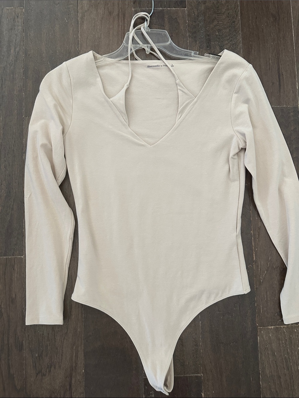 Abercrombie & Fitch Long Sleeve V-Neck Bodysuit in Cream
